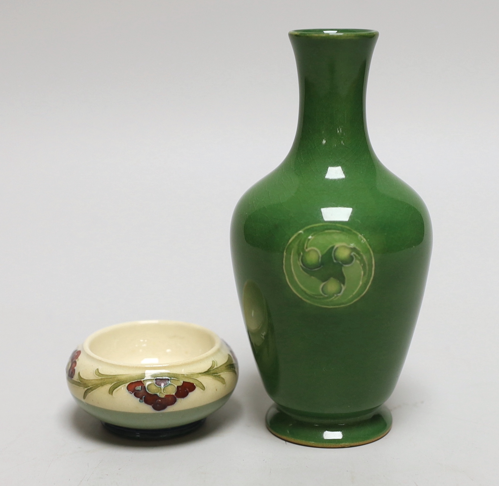 A Moorcroft for Liberty & Co. Flamminian ware green-glazed vase and a Mcintyre salt, tallest 13cm
